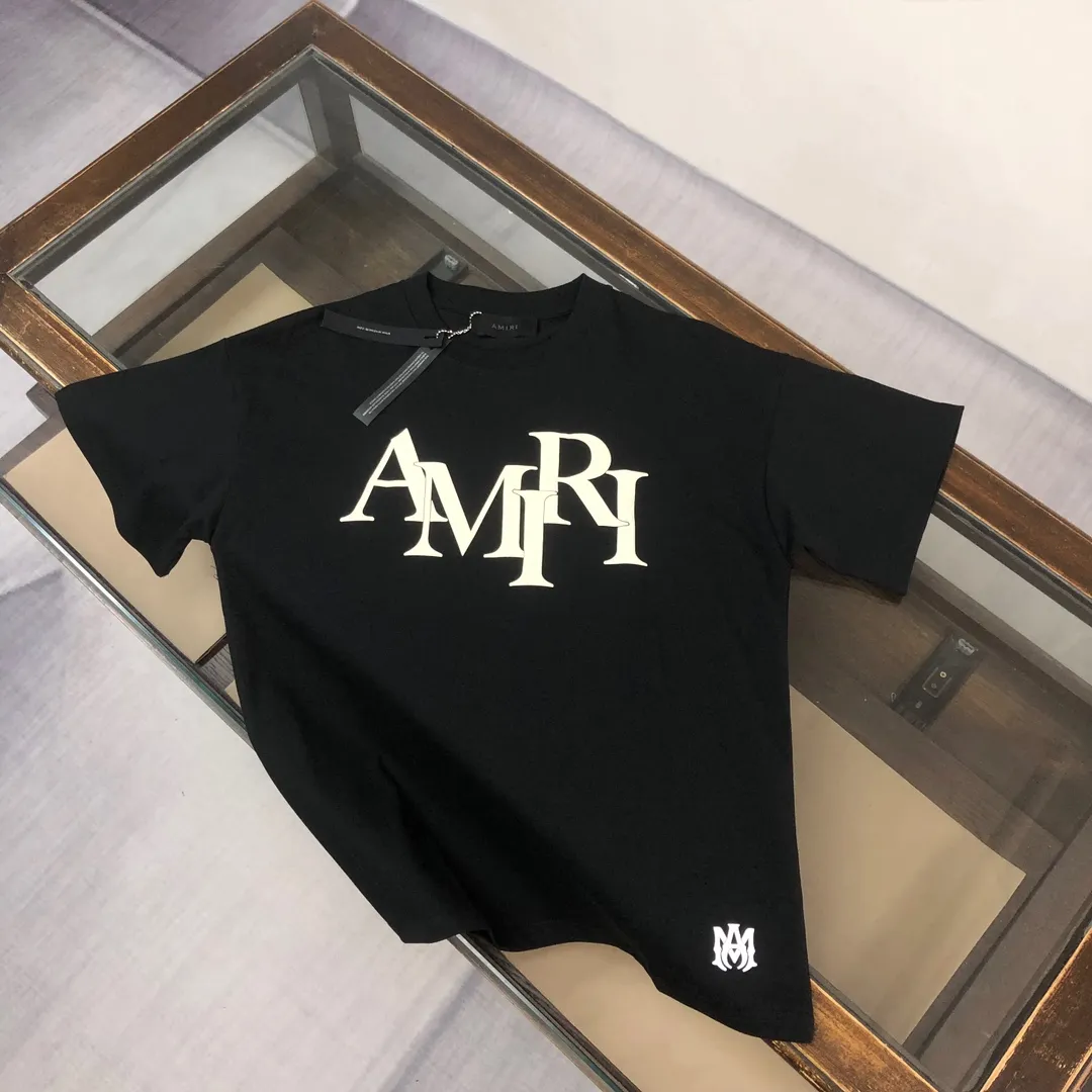 C🌟Amiri 26ss counter Same Style round neck short-sleeved T-shirt ~ Customized suede foam embossed logo craft on the chest! Specially available in custom fabrics! Thick plate three-dimensional! The thicker clothes make the overall breathable and soft texture more prominent, and the full cotton texture makes it extremely comfortable. A must-have item for Premium people, complete with original accessories and accessories! Same Style for men and women! Color: Black White Mint Green Size: XS S M L (larger version! Please state your height and weight when placing an order!)